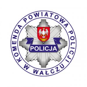 gwiazda policyjna, w niej napis Policja, dokoła napis KPP Wałcz, w środku gwiazdy herb powiatu