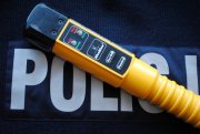 alkotest pod nim napis Policja