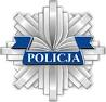 Gwiazda policyjna w srebrnym kolorze z napisem Policja, w kolorze niebieskim